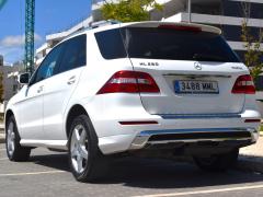https://www.feria.autoroyal.es/media/com_expautospro/images/big/turismos_todo_terrenos_y_furgonetas_mercedes_ml_250_664f24de62092.JPG